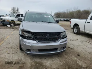 2017 Dodge Journey SE with VIN 3C4PDCAB9HT573188, listed as a Copart auction lot 51996425 with 121,978 mi miles and Salvage Title. Bid and sale history available at DreamBid. Image 5.