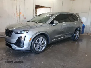 2023 Cadillac XT6 FWD Premium Luxury with VIN 1GYKPCRS7PZ161455, listed as a Copart auction lot 42239565 with 49,628 mi miles and Salvage Title. Bid and sale history available at carsss.com. Image 1.