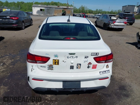2022 Kia Rio S with VIN 3KPA24AD7NE492807, listed as a IAAI auction lot 42050520 with 100,756 mi miles. Bid and sale history available at carsss.com. Image 17.