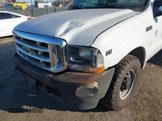 2002 Ford Super Duty F-250 XL with VIN 1FTNF20L72EB79640, listed as a IAAI auction lot 41667865 with 153,384 mi miles. Bid and sale history available at carsss.com. Image 6.