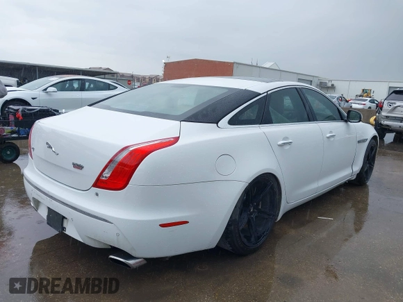 2012 Jaguar XJ with VIN SAJWA1CB7CLV35339, listed as a IAAI auction lot 41945850 with 123,501 mi miles and . Bid and sale history available at DreamBid. Image 4.