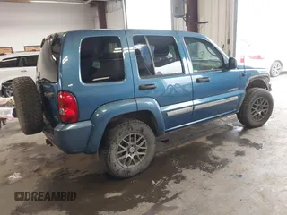 2004 Jeep Liberty Limited with VIN 1J4GK58K84W226666, listed as a IAAI auction lot 41764238 with 148,664 mi miles. Bid and sale history available at carsss.com. Image 4.