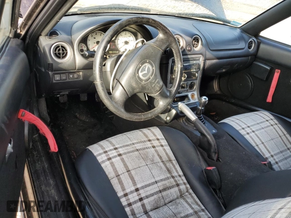 2004 Mazda MX-5 Miata LS with VIN JM1NB353140408906, listed as a Copart auction lot 56664715 with 86,603 mi miles and Salvage title. Bid and sale history available at DreamBid. Image 8.