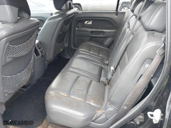 2006 Honda Pilot EX-L with VIN 5FNYF28546B000400, listed as a IAAI auction lot 41530610 with 284,633 mi miles. Bid and sale history available at carsss.com. Image 8.