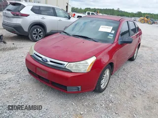 2011 Ford Focus SE with VIN 1FAHP3FN7BW189853, listed as a IAAI auction lot 42121843 with 98,921 mi miles. Bid and sale history available at carsss.com. Image 2.