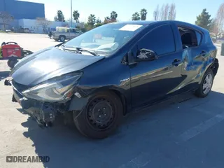 2015 Toyota Prius c One with VIN JTDKDTB39F1111784, listed as a IAAI auction lot 41742858 with 229,809 mi miles. Bid and sale history available at carsss.com. Image 2.