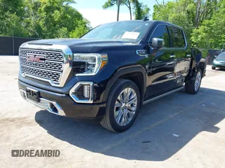2021 GMC Sierra 1500 Denali with VIN 1GTU9FEL4MZ253708, listed as a IAAI auction lot 42209839 with 52,279 mi miles and . Bid and sale history available at DreamBid. Image 18.