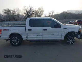 2019 Ford F-150 XL with VIN 1FTEW1EP8KKE13811, listed as a IAAI auction lot 41769452 with 133,146 mi miles and . Bid and sale history available at DreamBid. Image 13.