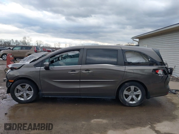 2019 Honda Odyssey EX with VIN 5FNRL6H50KB097304, listed as a IAAI auction lot 41659899 with 128,641 mi miles. Bid and sale history available at carsss.com. Image 14.