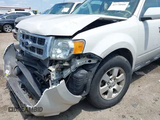 2010 Ford Escape Limited with VIN 1FMCU9E72AKC27235, listed as a IAAI auction lot 42378666 with 112,991 mi miles and . Bid and sale history available at DreamBid. Image 6.