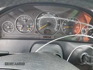 2000 Mercedes-Benz SL 500 z VIN WDBFA68F7YF191054, wystawiony jako Copart lot #58558115 z przebiegiem 118 710 mil mil oraz Szkoda całkowita • Salvage title. Historia ofert i sprzedaży dostępna na DreamBid. Obrazek 9.