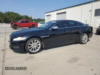 2015 Jaguar XJ with VIN SAJWA1CZ7F8V83167, listed as a Copart auction lot 74991144 with 94,502 mi miles and Salvage Title. Bid and sale history available at carsss.com. Image 1.