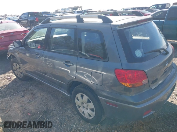 2004 Mitsubishi Outlander LS with VIN JA4LX31F344003223, listed as a IAAI auction lot 41614338 with 135,101 mi miles. Bid and sale history available at carsss.com. Image 3.