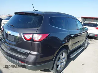 2016 Chevrolet Traverse LT with VIN 1GNKRGKD4GJ326001, listed as a IAAI auction lot 41826843 with 87,274 mi miles. Bid and sale history available at carsss.com. Image 4.