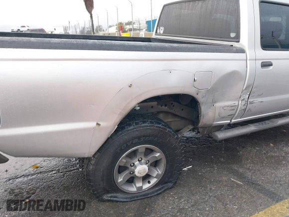 2004 Nissan Frontier XE z VIN 1N6ED29X04C423328, wystawiony jako IAAI lot #41514717 z przebiegiem 297 128 mil mil oraz . Historia ofert i sprzedaży dostępna na DreamBid. Obrazek 6.