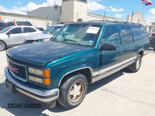 1995 GMC Suburban with VIN 1GKEC16KXSJ712111, listed as a IAAI auction lot 42185423 with 269,010 mi miles and . Bid and sale history available at DreamBid. Image 2.
