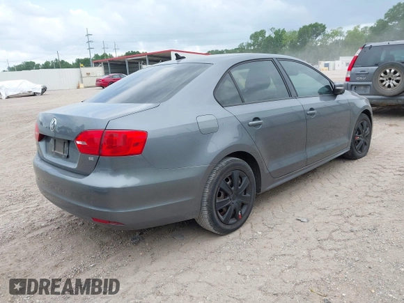 2014 Volkswagen Jetta Sedan SE w/Connectivity/Sunroof PZEV with VIN 3VWD17AJ6EM247300, listed as a IAAI auction lot 42074917 with 170,131 mi miles. Bid and sale history available at carsss.com. Image 4.