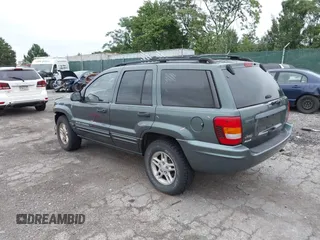 2004 Jeep Grand Cherokee Laredo with VIN 1J4GW48S24C276284, listed as a IAAI auction lot 42596655 with 142,524 mi miles and . Bid and sale history available at DreamBid. Image 3.