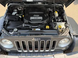 2016 Jeep Wrangler Unlimited Sahara with VIN 1C4BJWEG9GL169490, listed as a Copart auction lot 61507025 with 198,602 mi miles and Clean title. Bid and sale history available at DreamBid. Image 7.
