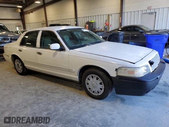 2006 Mercury Grand Marquis GS z VIN 2MEFM74V96X621050, wystawiony jako Copart lot #49098465 z przebiegiem 75 561 mil mil oraz Szkoda całkowita • Salvage title. Historia ofert i sprzedaży dostępna na DreamBid. Obrazek 4.