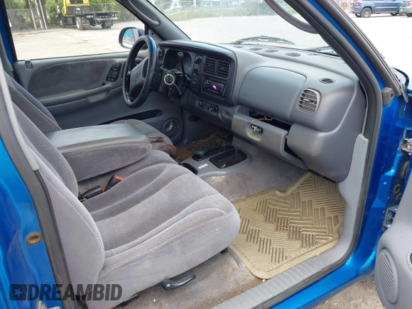2000 Dodge Dakota z VIN 1B7FL26X1YS799143, wystawiony jako IAAI lot #42303206 z przebiegiem 148 576 mil mil oraz . Historia ofert i sprzedaży dostępna na DreamBid. Obrazek 5.