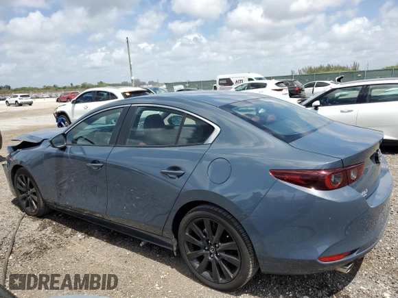 2025 Mazda 3 S Carbon Edition with VIN 3MZBPBCM2SM455573, listed as a Copart auction lot 54517615 with 3,844 mi miles and Clean Title. Bid and sale history available at DreamBid. Image 2.