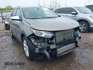 2019 Chevrolet Equinox Premier z VIN 3GNAXNEVXKS503474, wystawiony jako IAAI lot #42084263 z przebiegiem 93 838 mil mil oraz . Historia ofert i sprzedaży dostępna na DreamBid. Obrazek 1.