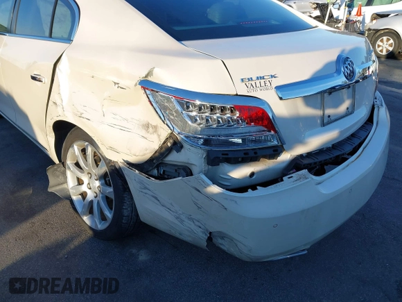 2013 Buick LaCrosse Touring with VIN 1G4GJ5E32DF162786, listed as a IAAI auction lot 41327452 with 221,117 mi miles and . Bid and sale history available at DreamBid. Image 6.