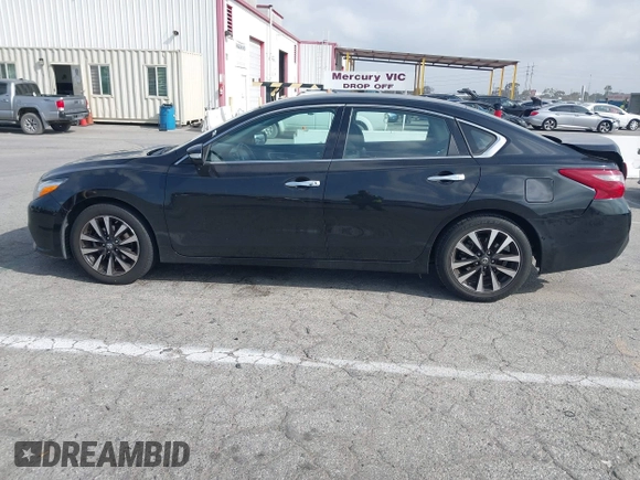 2018 Nissan Altima SR with VIN 1N4AL3AP7JC279459, listed as a IAAI auction lot 41901831 with 104,798 mi miles and . Bid and sale history available at DreamBid. Image 14.