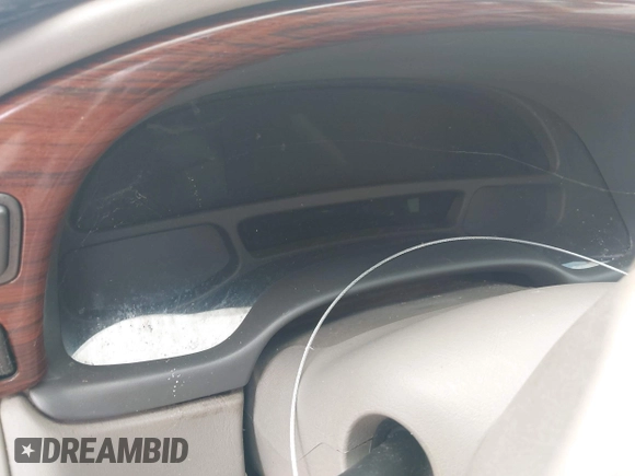 2005 Cadillac DeVille z VIN 1G6KD54Y25U147188, wystawiony jako IAAI lot #42421182 z przebiegiem Nie podano mil oraz . Historia ofert i sprzedaży dostępna na DreamBid. Obrazek 7.