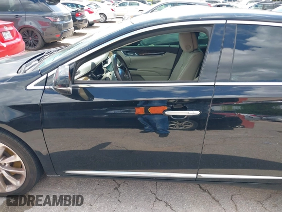 2013 Cadillac XTS Premium with VIN 2G61S5S39D9144177, listed as a IAAI auction lot 42111910 with 69,830 mi miles. Bid and sale history available at carsss.com. Image 14.