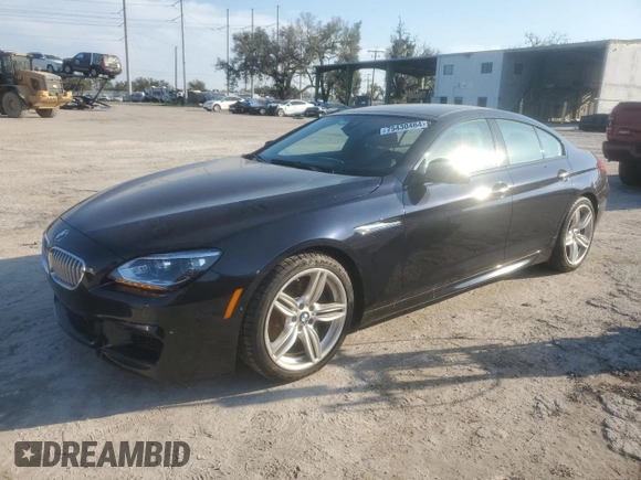 2015 BMW 6 Series 650i xDrive with VIN WBA6B4C55FD761530, listed as a Copart auction lot 75430464 with 18,729 mi miles and Salvage Title. Bid and sale history available at DreamBid. Image 1.