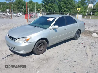 2003 Toyota Camry LE with VIN 4T1BE32K03U135482, listed as a IAAI auction lot 42145175 with 172,725 mi miles and . Bid and sale history available at DreamBid. Image 2.