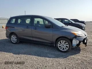 2013 Mazda 5 Touring with VIN JM1CW2CL5D0152715, listed as a Copart auction lot 71315534 with 219,315 mi miles and Salvage Title. Bid and sale history available at DreamBid. Image 4.