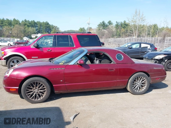 2004 Ford Thunderbird Deluxe with VIN 1FAHP60A34Y110824, listed as a IAAI auction lot 42155374 with 77,042 mi miles. Bid and sale history available at carsss.com. Image 14.