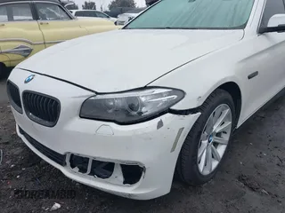 2014 BMW 5 Series 535i with VIN WBA5B1C57ED475963, listed as a IAAI auction lot 41914997 with 92,037 mi miles and . Bid and sale history available at DreamBid. Image 6.