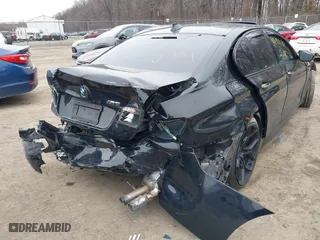 2013 BMW M5 with VIN WBSFV9C52DD096793, listed as a IAAI auction lot 41619270 with 1 mi miles. Bid and sale history available at carsss.com. Image 6.