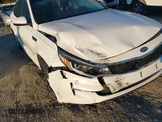2018 Kia Optima LX with VIN 5XXGT4L32JG265716, listed as a IAAI auction lot 40645411 with 112,305 mi miles and . Bid and sale history available at DreamBid. Image 6.