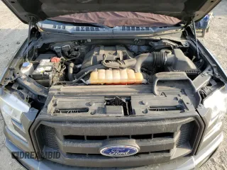 2015 Ford F-150 XLT z VIN 1FTEX1EP6FFC63287, wystawiony jako Copart lot #54207595 z przebiegiem 128 334 mil mil oraz Szkoda całkowita • Salvage title. Historia ofert i sprzedaży dostępna na DreamBid. Obrazek 11.