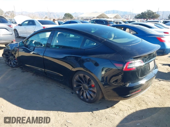 2021 Tesla Model 3 Performance with VIN 5YJ3E1EC6MF999321, listed as a IAAI auction lot 41417451 with 20,562 mi miles and . Bid and sale history available at carsss.com. Image 3.