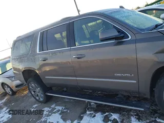 2016 GMC Yukon XL Denali with VIN 1GKS2HKJ8GR432174, listed as a IAAI auction lot 41411844 with 187,258 mi miles and . Bid and sale history available at carsss.com. Image 13.
