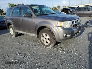 2009 Ford Escape XLS with VIN 1FMCU92749KB94402, listed as a Copart auction lot 60975645 with 171,202 mi miles and Clean title. Bid and sale history available at DreamBid. Image 4.