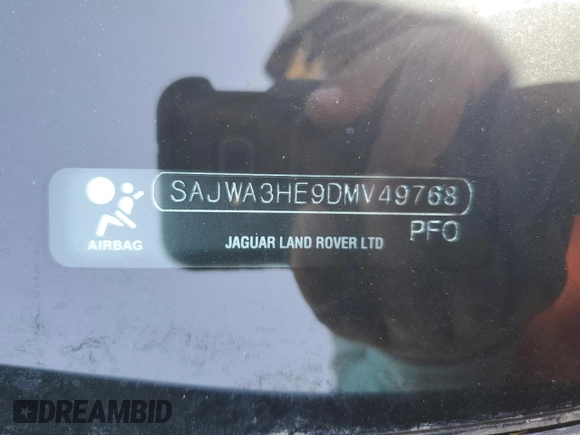 2013 Jaguar XJ with VIN SAJWA3HE9DMV49768, listed as a Copart auction lot 50339955 with 56,841 mi miles and Salvage Title. Bid and sale history available at DreamBid. Image 14.