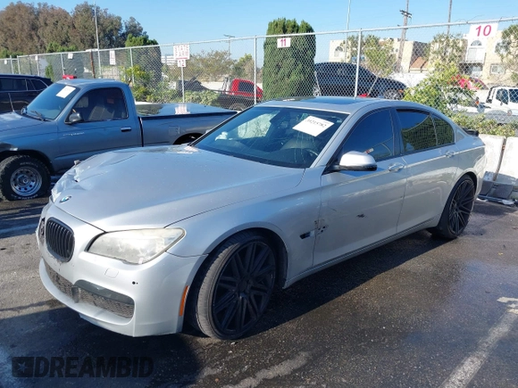 2013 BMW 7 Series 740i with VIN WBAYA6C51DD143836, listed as a IAAI auction lot 39215782 with 176,881 mi miles and . Bid and sale history available at DreamBid. Image 2.