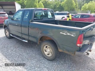 2003 Ford F-150 XL z VIN 1FTRX18L13NB27919, wystawiony jako IAAI lot #42313184 z przebiegiem 113 846 mil mil oraz . Historia ofert i sprzedaży dostępna na DreamBid. Obrazek 3.