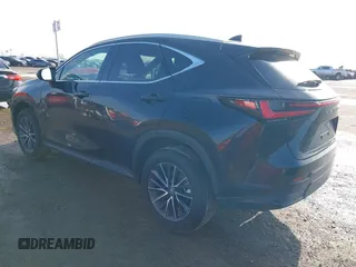 2023 Lexus NX 350h with VIN 2T2AKCEZ4PC010808, listed as a IAAI auction lot 41073898 with 30,815 mi miles and . Bid and sale history available at DreamBid. Image 3.