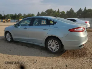 2014 Ford Fusion SE Hybrid with VIN 3FA6P0LU4ER106386, listed as a Copart auction lot 59627565 with 105,855 mi miles and Salvage title. Bid and sale history available at DreamBid. Image 2.