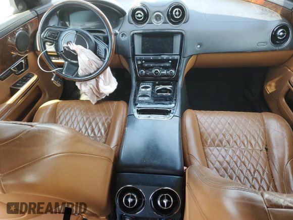 2017 Jaguar XJ with VIN SAJWJ2GD0H8W04917, listed as a Copart auction lot 72507934 with 112,042 mi miles and Salvage Title. Bid and sale history available at carsss.com. Image 8.