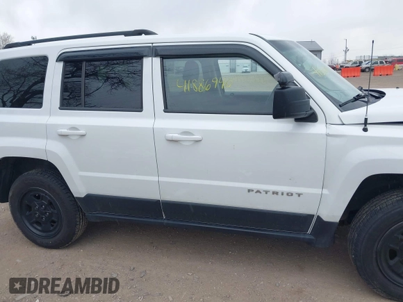 2014 Jeep Patriot Sport with VIN 1C4NJRBB9ED852112, listed as a IAAI auction lot 41886940 with 138,825 mi miles. Bid and sale history available at carsss.com. Image 12.