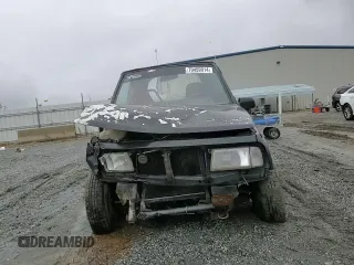 1992 Geo Tracker z VIN 2CNBJ18U8N6938728, wystawiony jako Copart lot #79459914 z przebiegiem 17 751 mil mil oraz Szkody całkowita. Historia ofert i sprzedaży dostępna na DreamBid. Obrazek 10.